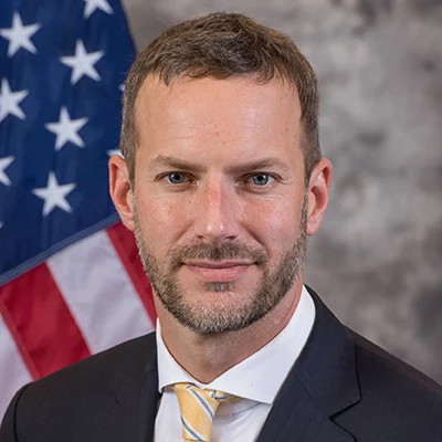 Headshot or formal portrait of Adam Boehler