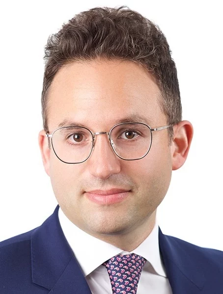 Headshot or formal portrait of Josh Gruenbaum